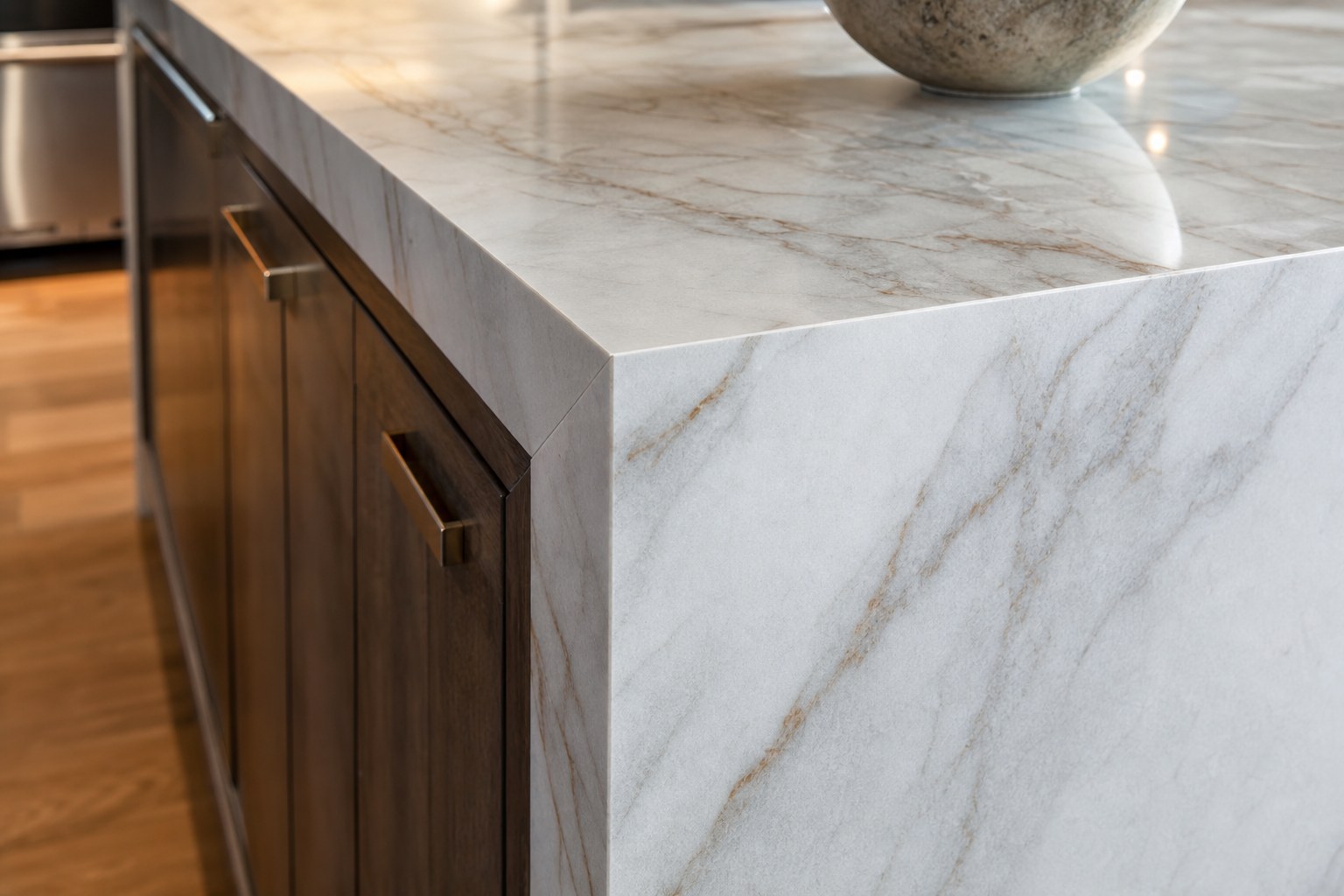 Waterfall-edge kitchen island tile cladding in a Chester County PA home